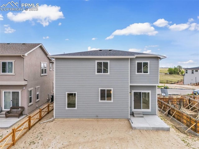 9759 Feathergrass Dr, Colorado Springs, CO 80927 - rear view of house with a patio area and a fenced backyard