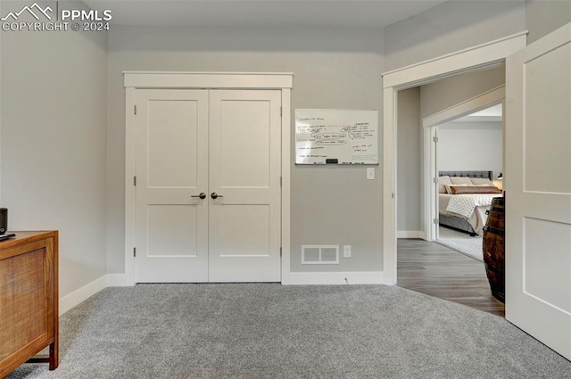 unfurnished bedroom with carpet flooring