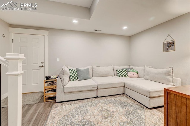 living room with hardwood / wood-style flooring