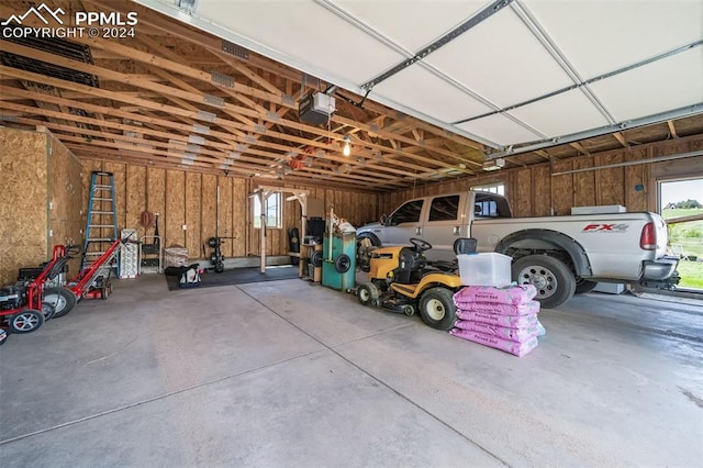 garage featuring a garage door opener