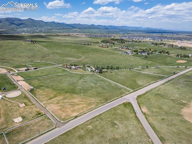 aerial view featuring a mountain view and a rural view