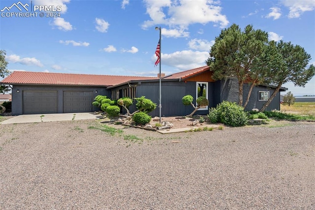 view of front of property with a garage