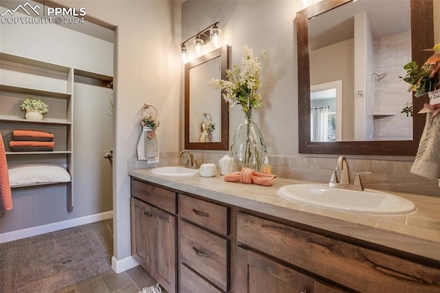 bathroom with vanity and tile patterned floors