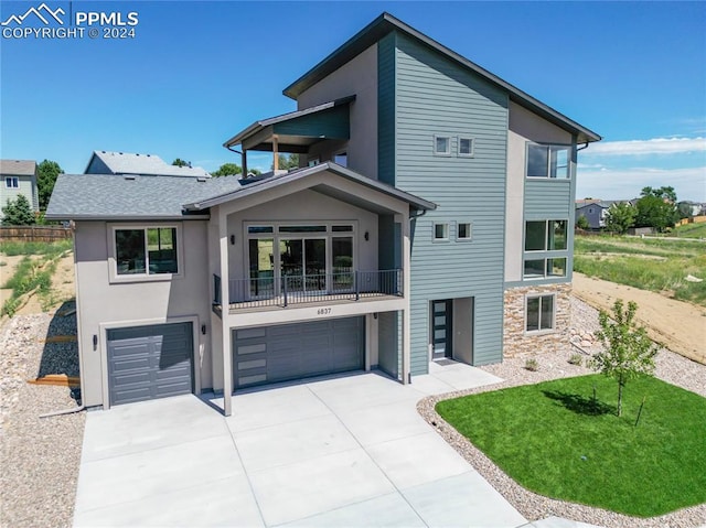 view of front of property featuring a garage