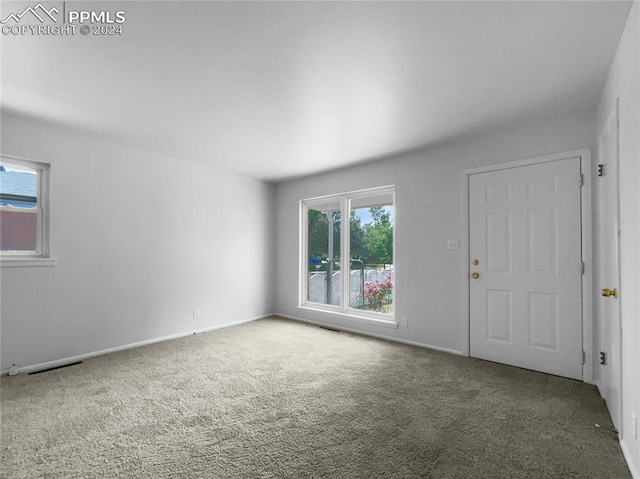 view of carpeted spare room