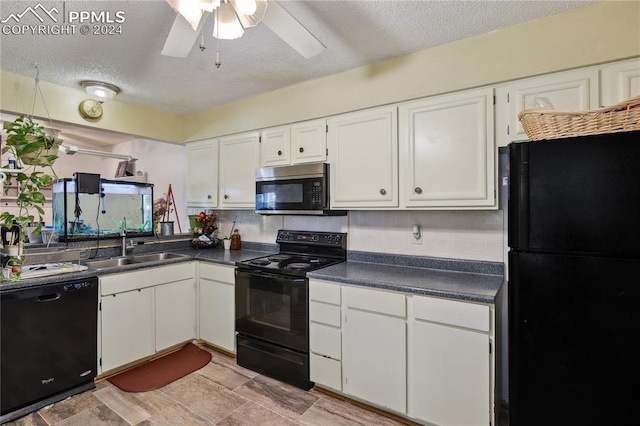 kitchen featuring sink, ceiling fan, black appliances, a textured ceiling, and white cabinets