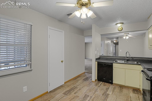 kitchen featuring ceiling fan, sink, a textured ceiling, and black appliances