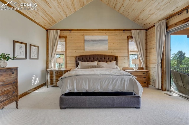 carpeted bedroom featuring vaulted ceiling, wooden ceiling, wooden walls, and access to outside