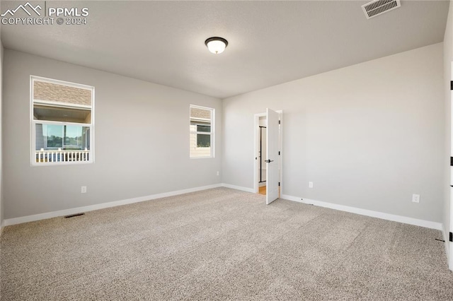 view of carpeted spare room