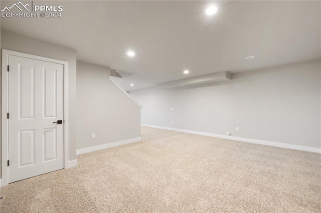 basement with light carpet