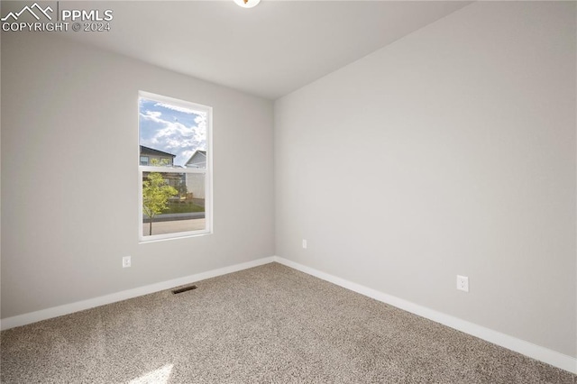 unfurnished room with carpet floors