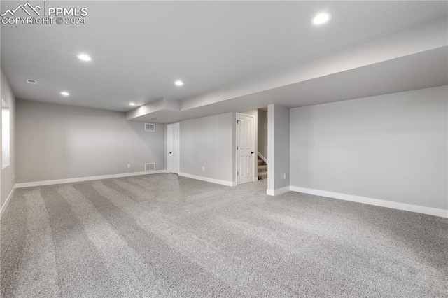 basement with carpet flooring