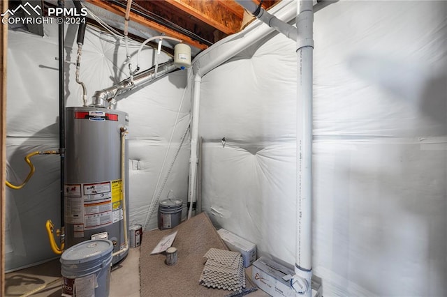 utility room featuring gas water heater