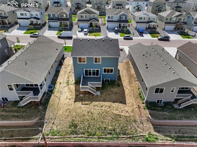 birds eye view of property featuring a rural view