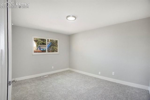 view of carpeted spare room