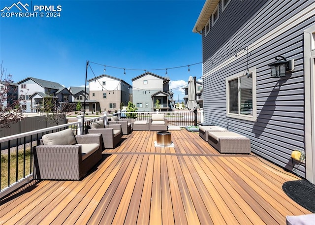 deck with an outdoor hangout area