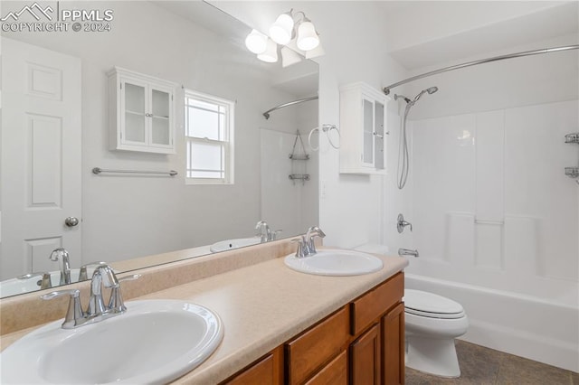 full bathroom featuring shower / bath combination, tile patterned floors, vanity, an inviting chandelier, and toilet