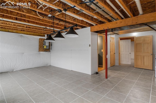 basement with tile patterned floors