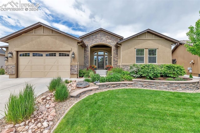 view of front of property featuring french doors, a front lawn, and a garage