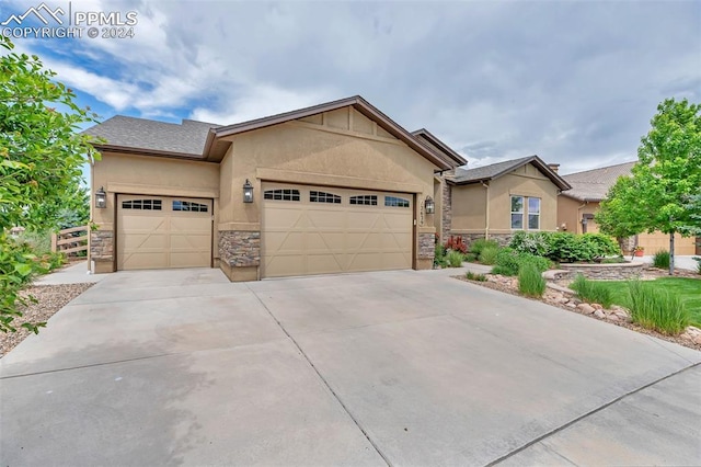 view of front of property featuring a garage