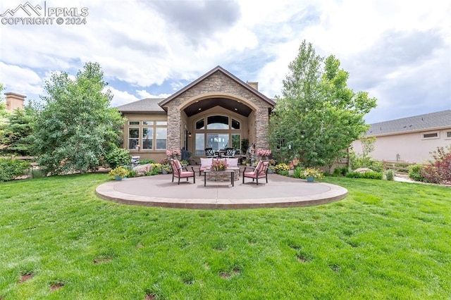 rear view of property with a yard, an outdoor hangout area, and a patio area