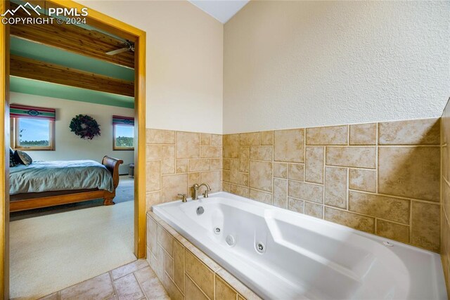 bathroom featuring tile flooring and ceiling fan