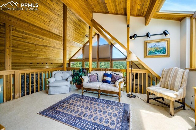 interior space featuring carpet flooring, lofted ceiling with beams, and wood ceiling