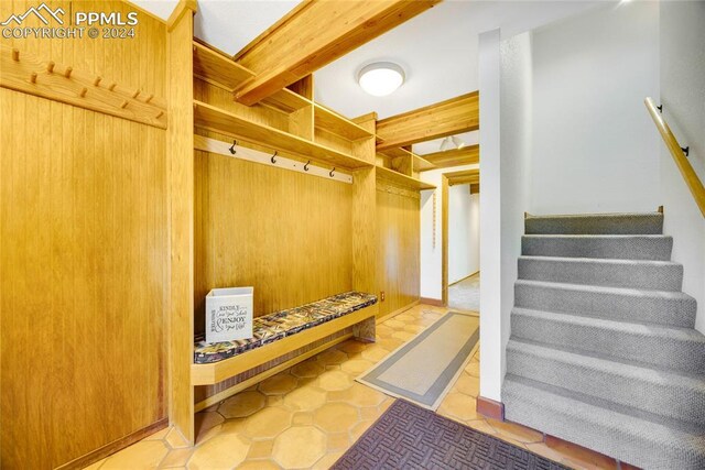 mudroom with tile floors