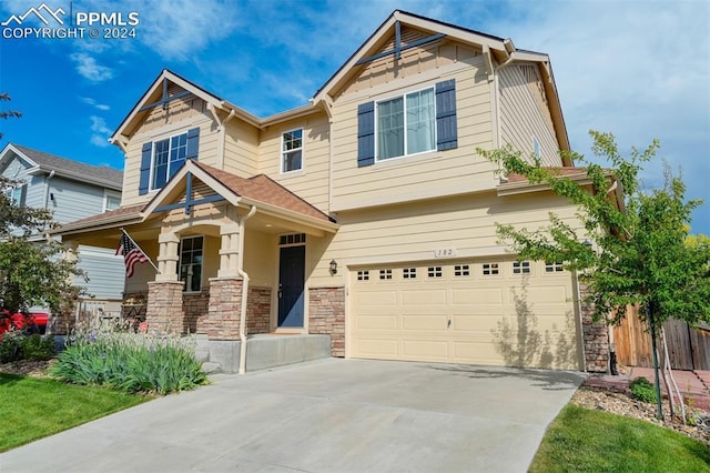 craftsman inspired home with a garage