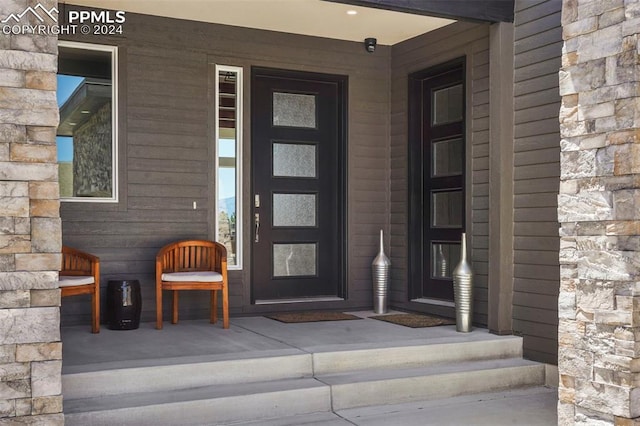 entrance to property with a porch