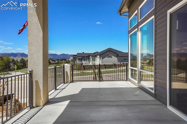 balcony featuring a mountain view