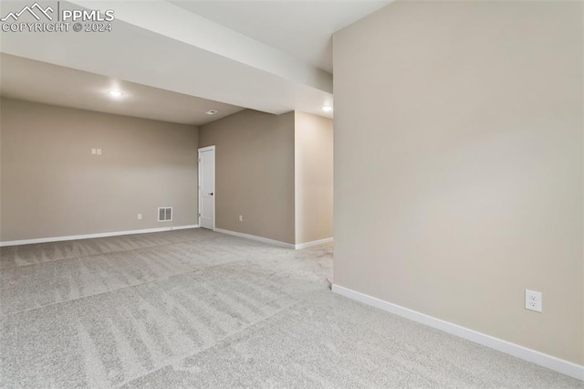 spare room with carpet flooring