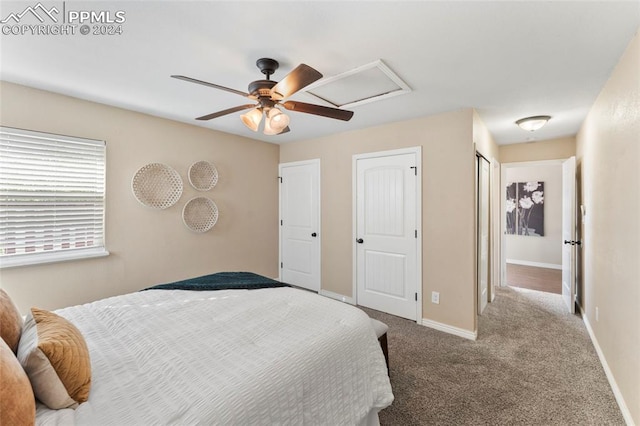 carpeted bedroom featuring ceiling fan