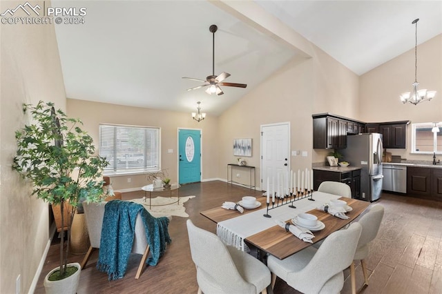 dining area featuring high vaulted ceiling, sink, hardwood / wood-style flooring, and ceiling fan with notable chandelier