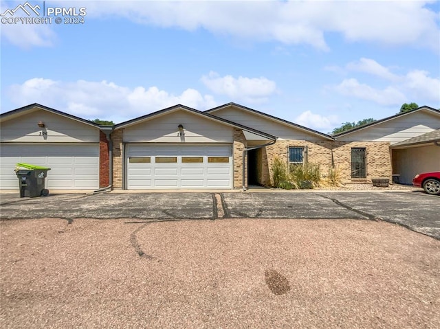 single story home featuring a garage