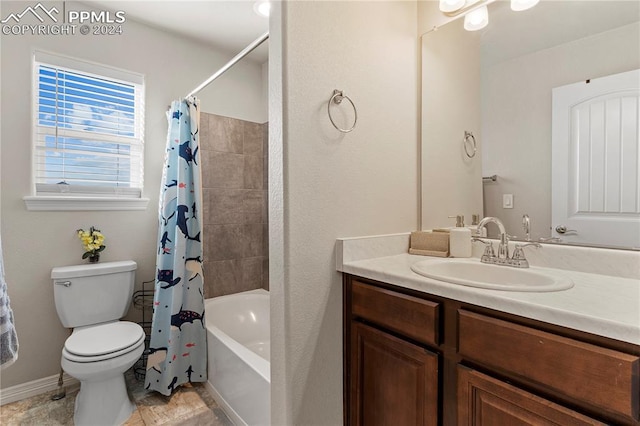 full bathroom featuring vanity, toilet, and shower / bathtub combination with curtain