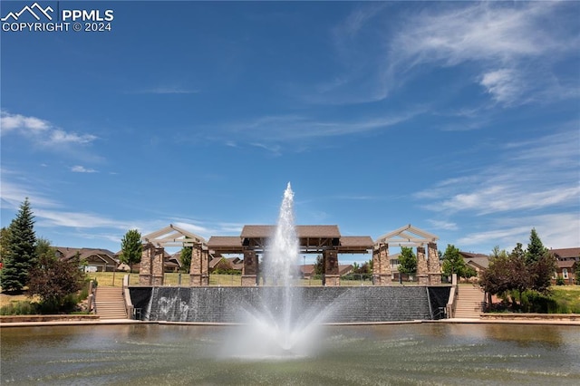 view of home's community featuring a water view