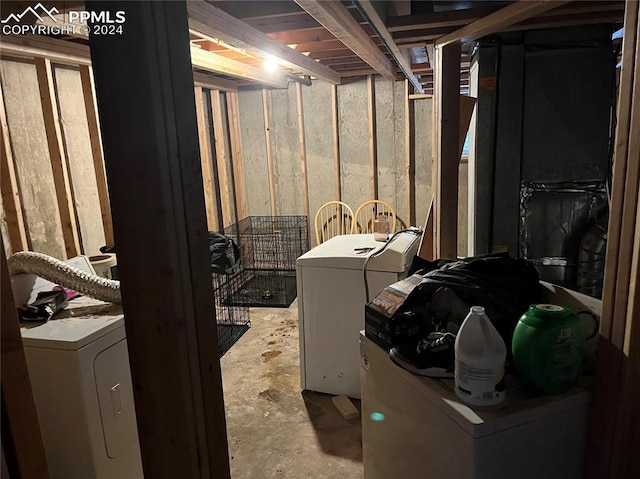 laundry area featuring washing machine and clothes dryer