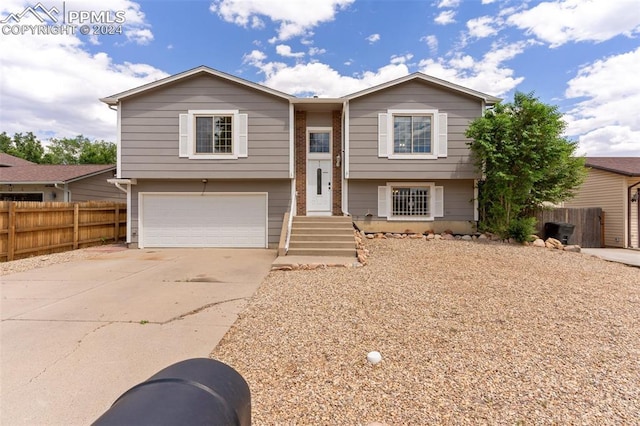 raised ranch with a garage