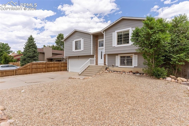 raised ranch with a garage