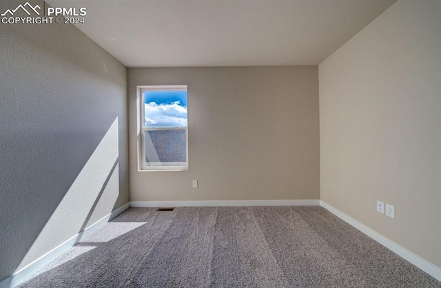 view of carpeted spare room