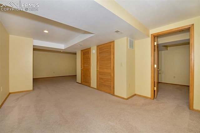 basement featuring carpet flooring