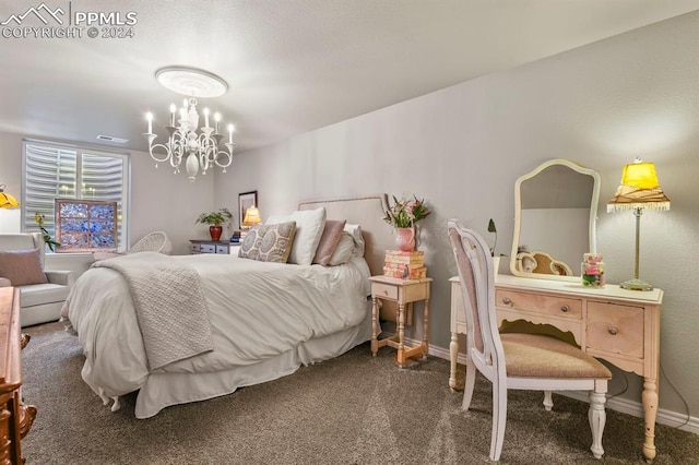 carpeted bedroom featuring a chandelier