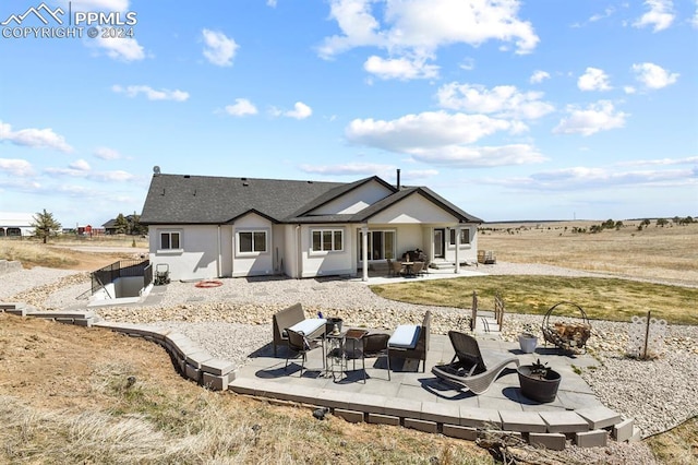 back of property featuring a patio