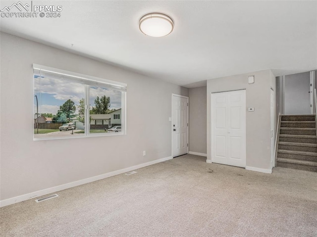 interior space featuring carpet flooring