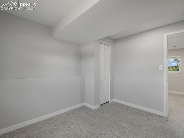 empty room featuring carpet floors