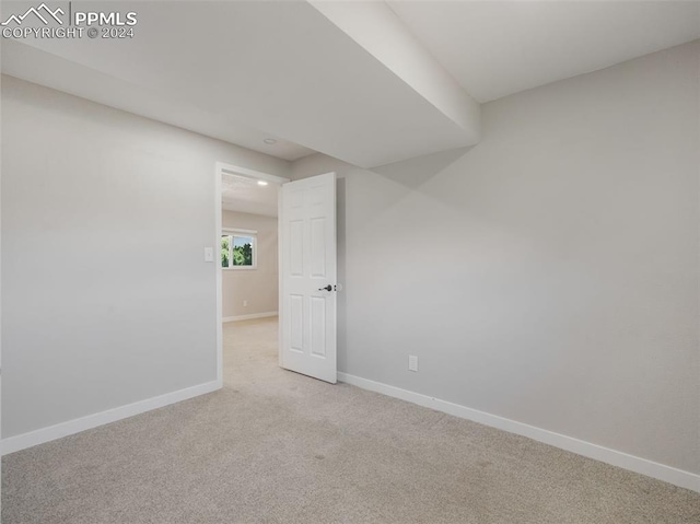 empty room with carpet floors