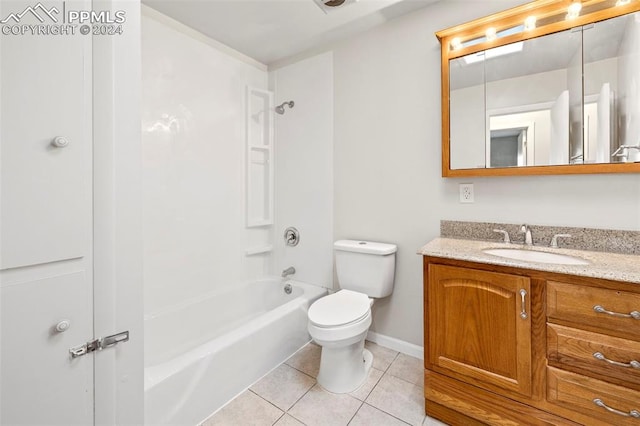 full bathroom with vanity, tile patterned flooring, toilet, and shower / washtub combination