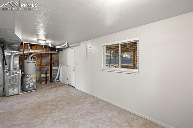 basement featuring gas water heater