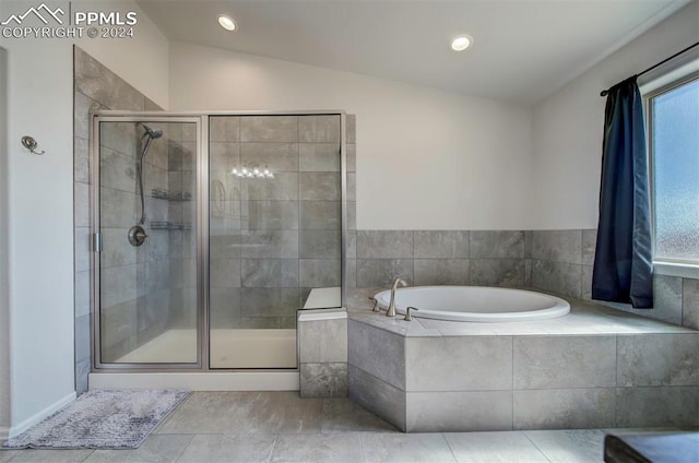 bathroom featuring tile patterned floors, plus walk in shower, and vaulted ceiling